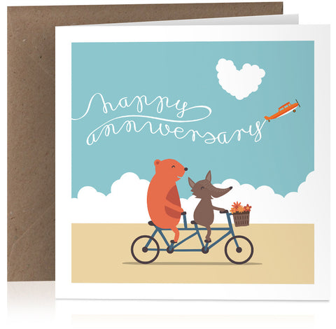 Cute illustrated anniversary card with animals riding a tandem bike